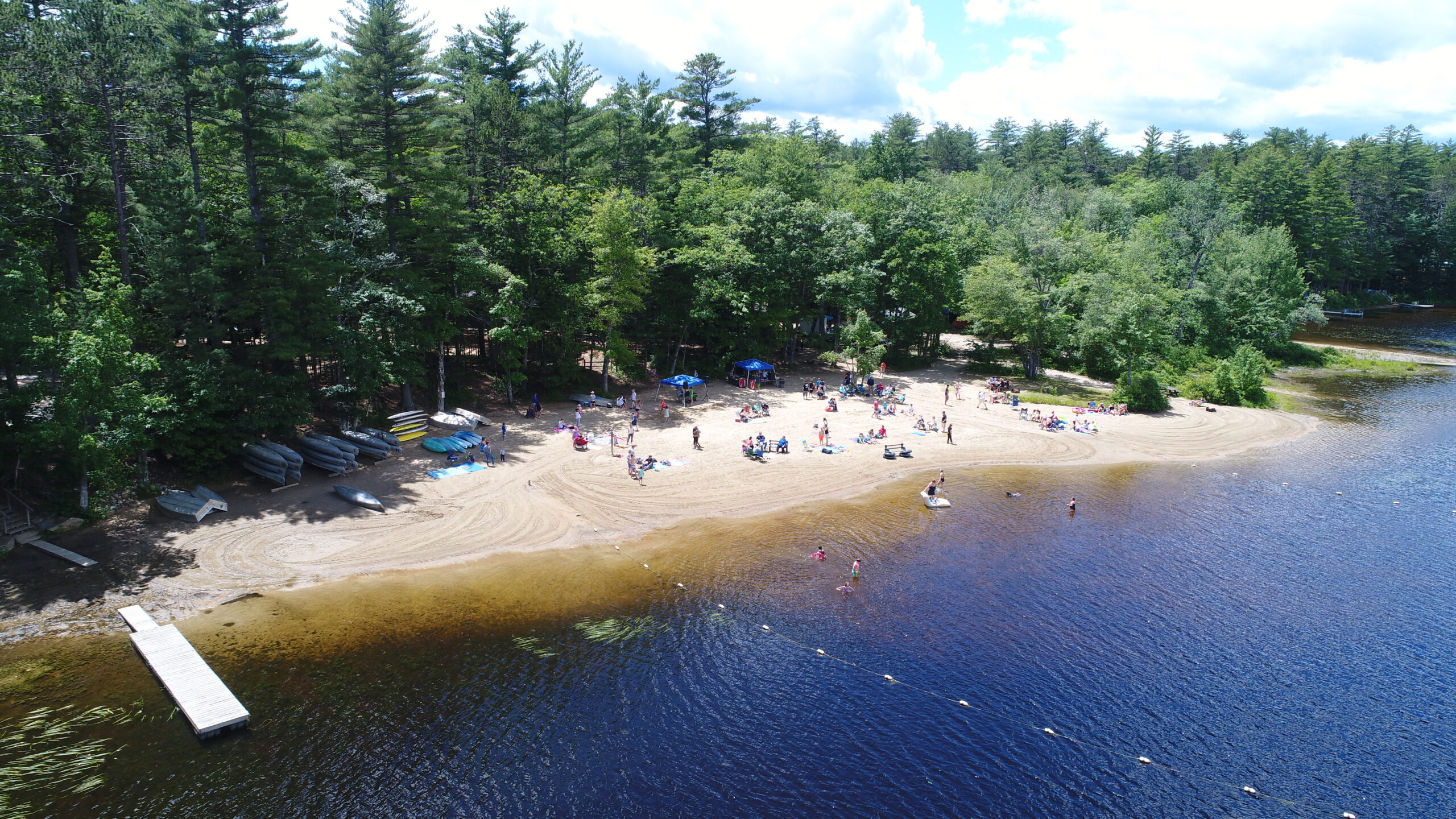 The beach and lake at Papoose Pond Family Campground